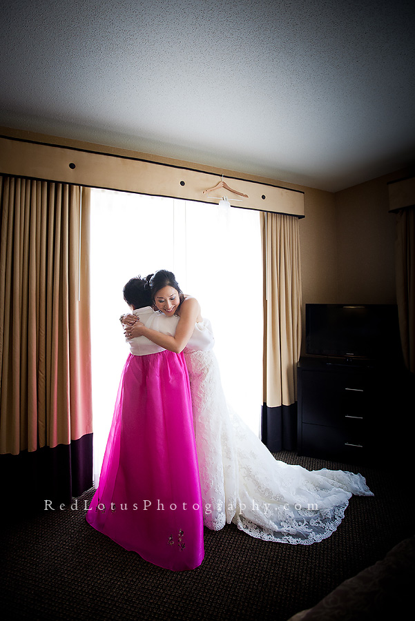 bride hugging mother