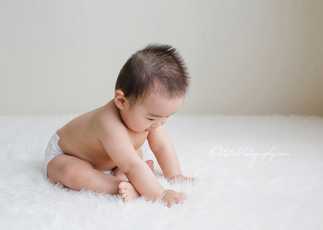 baby on a neutral backrop