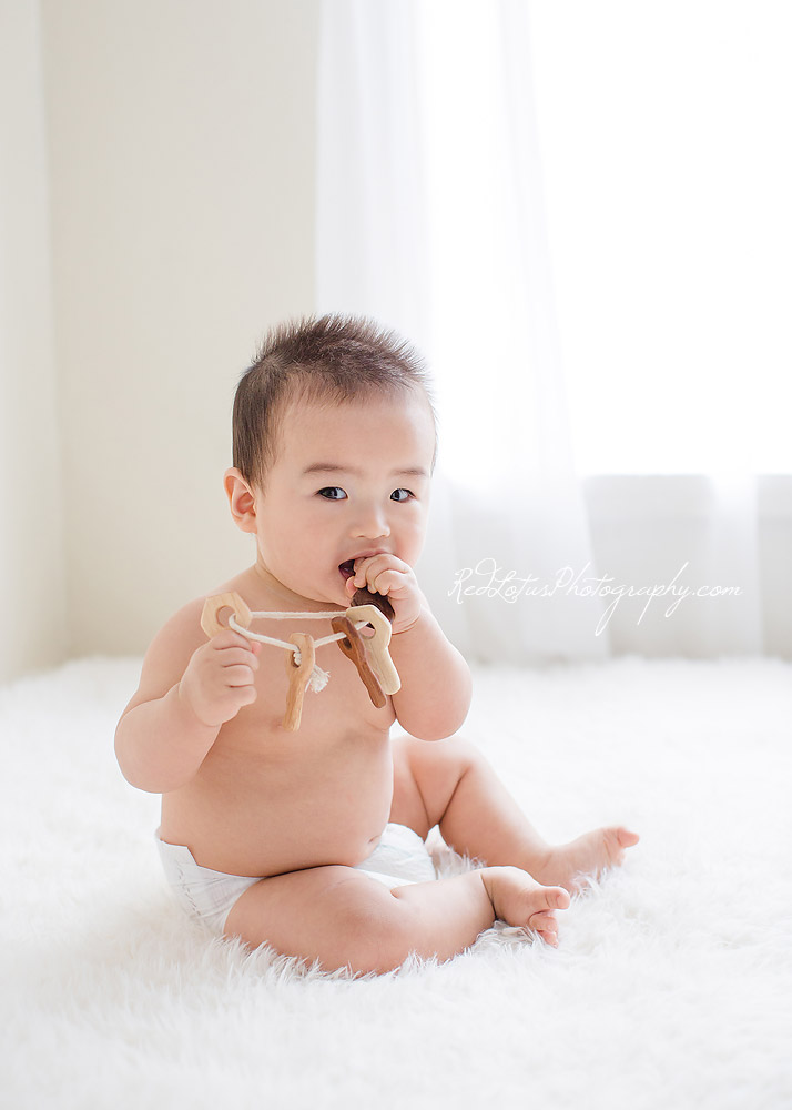 simple baby photography on a neutral backdrop